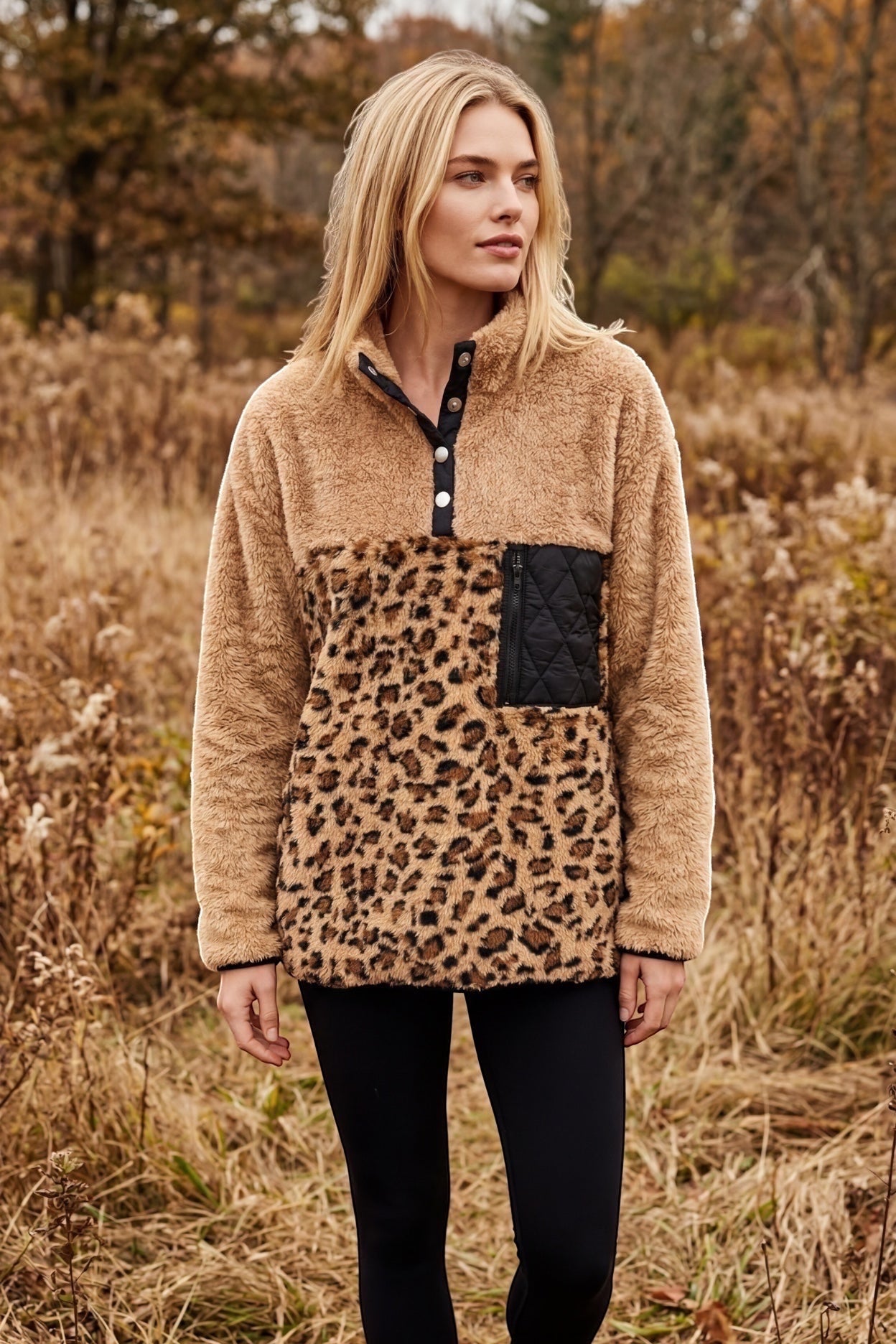 Restless beige sherpa fleece pullover with leopard print panel, black quilted pocket, and snap-button collar.