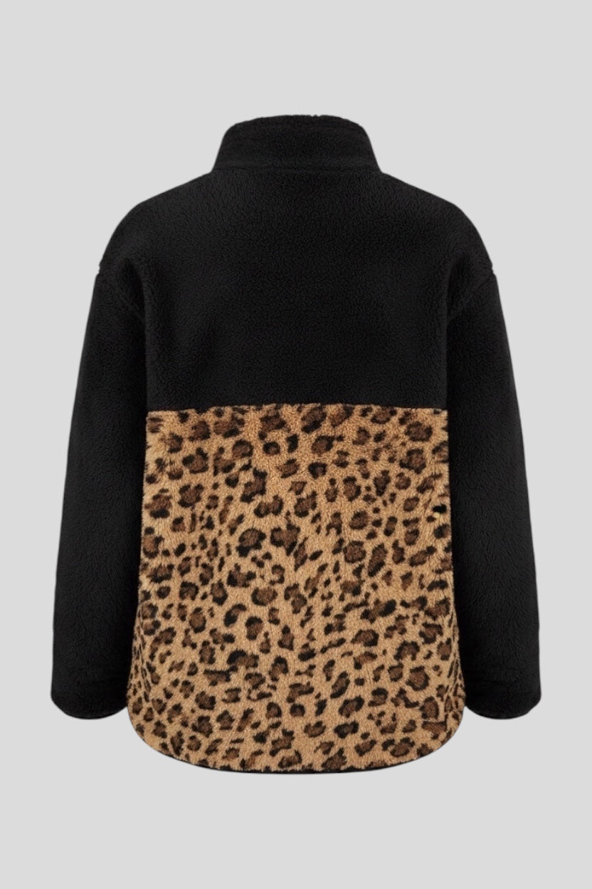 Restless black sherpa fleece jacket with leopard print panel, high neck, and relaxed fit.