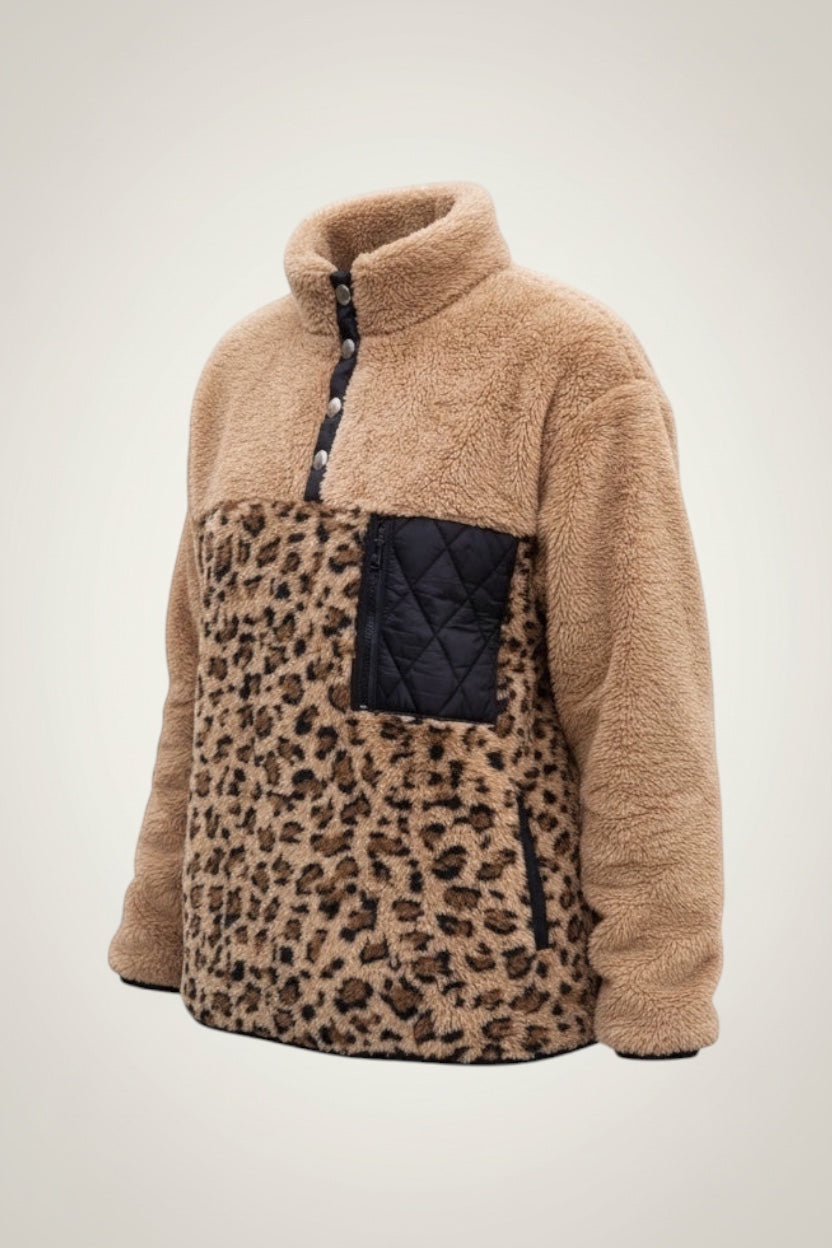 Restless beige and leopard print sherpa fleece pullover with high neck, snap closure, and black quilted chest pocket.